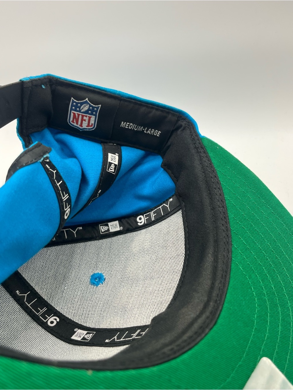 New Era 9Fifty  Carolina Panthers Teal Snapback Hat with Black & White Logo - Picture 5 of 6
